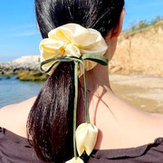 Tulip scrunchie styled on ponytail
