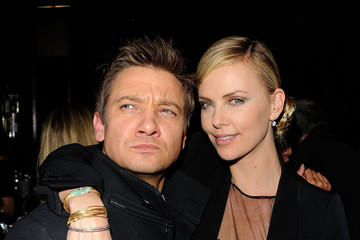 Photo of Jeremy Renner  & his friend Charlize Theron
