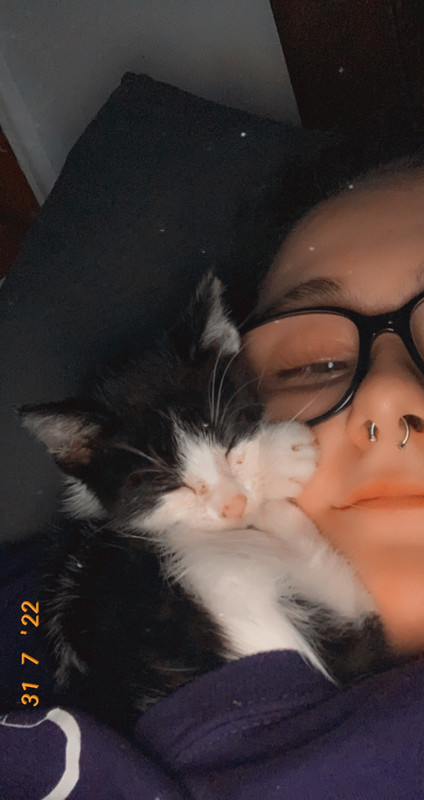 Kiana with her cat, Nugget.