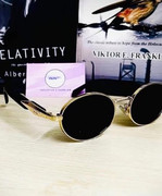 Oval Gold Frame Prada Milano sunglasses