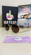 Round Black Bold Prada Milano sunglasses