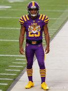dreamina-2026-09-15-7583-Full-body-shot-of-a-college-football-pla