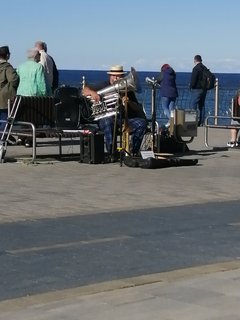 музыкант на променаде