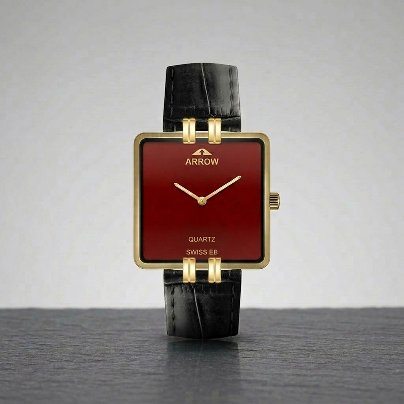 Sports watch with orange accents and rubber strap on dark surface