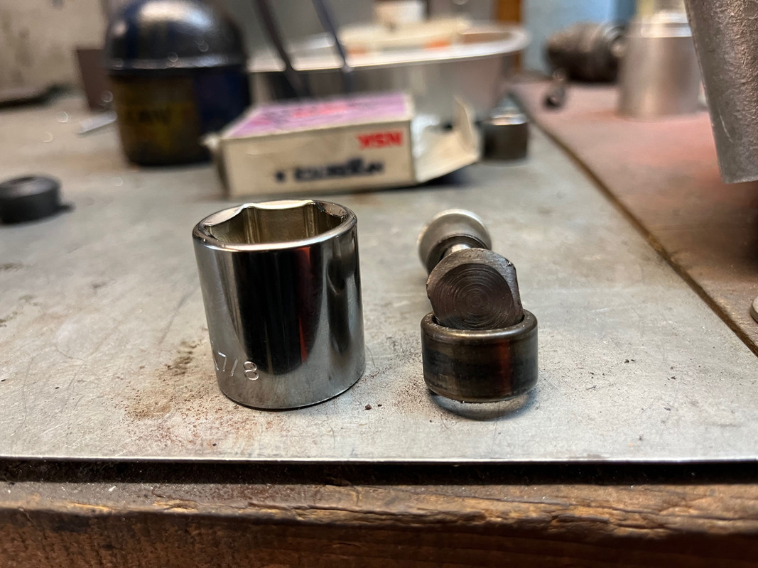 needle bearing removal tool partly in place