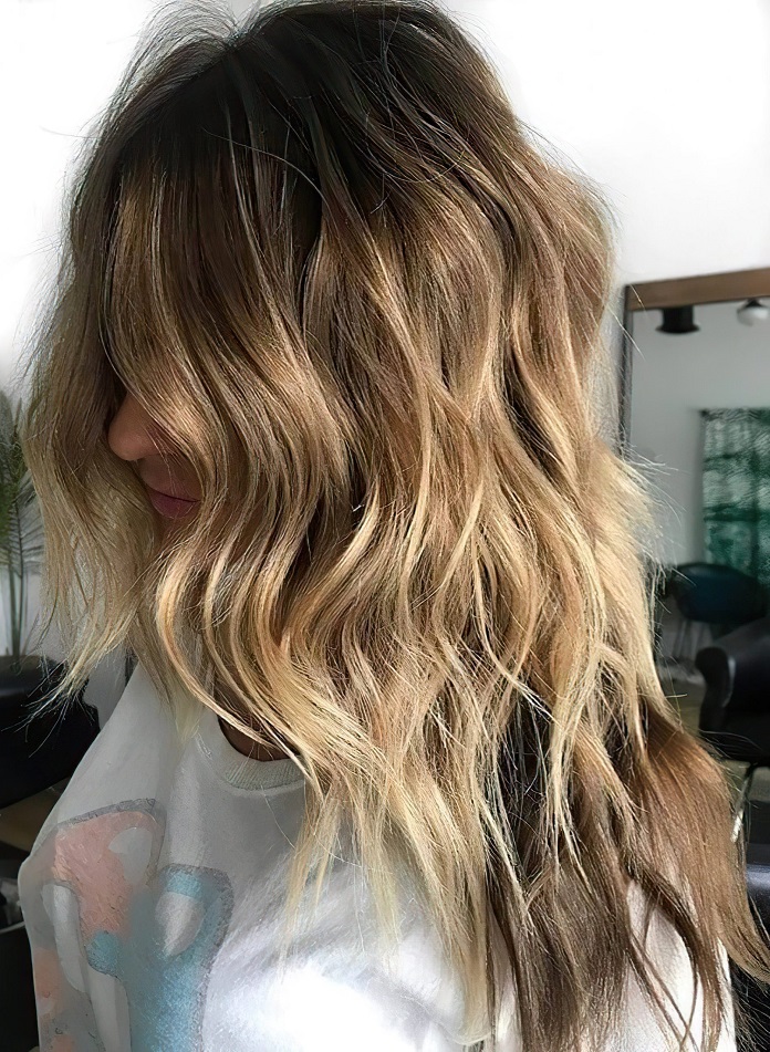 Wavy strong long blonde hair in Classic Octopus Haircut