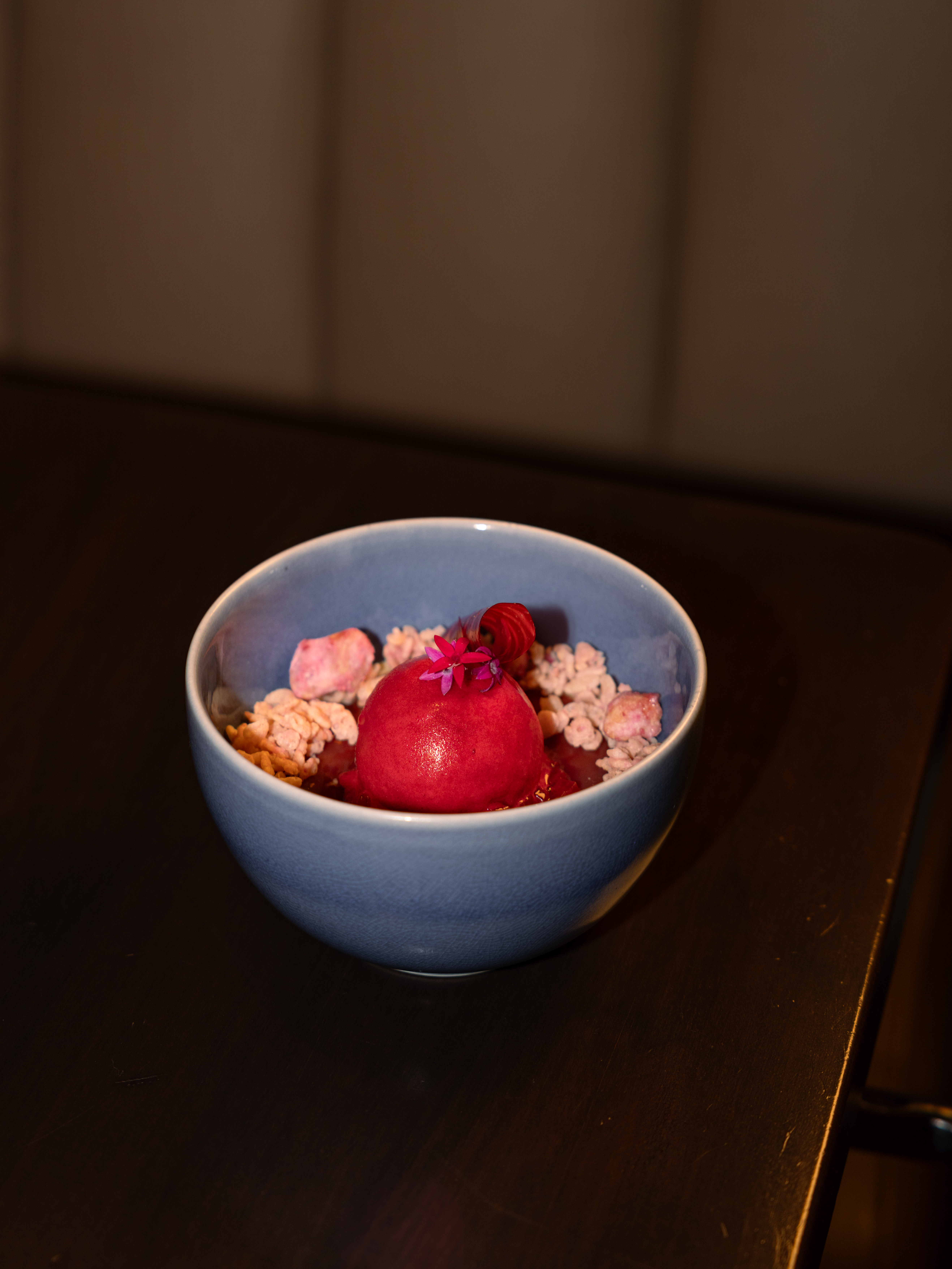 Nami Koshihikari rice pudding with red berries and almonds dessert