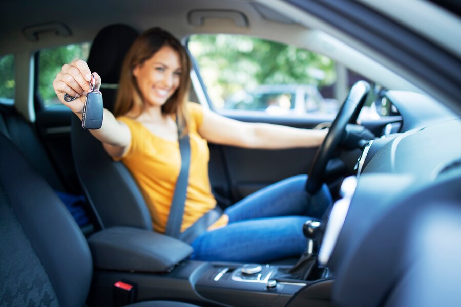 beautiful female women driver sitting her vehicle holding car keys ready drive 342744 700