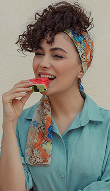 Woman eating watermelon