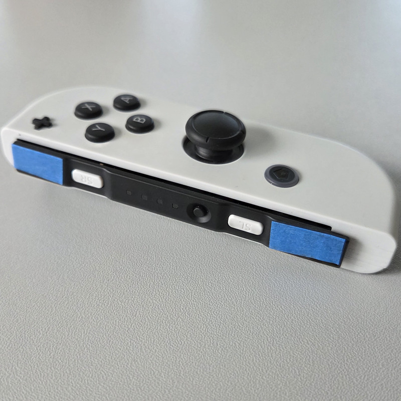 joycon masking tape on rail