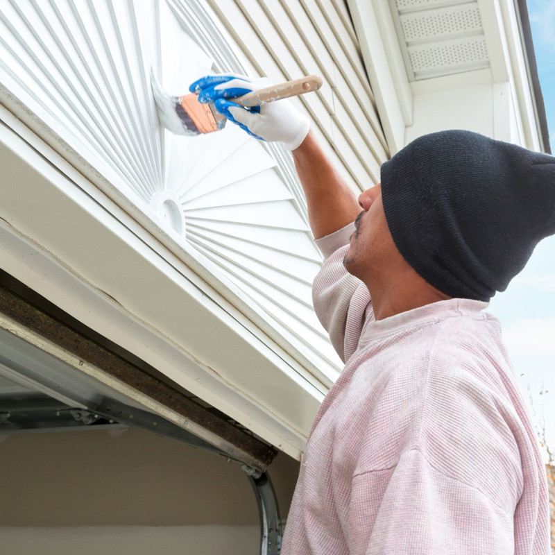 male-builder-uniform-helmet-gloves-painting-wall-with-roller-back-view Exterior painting colors