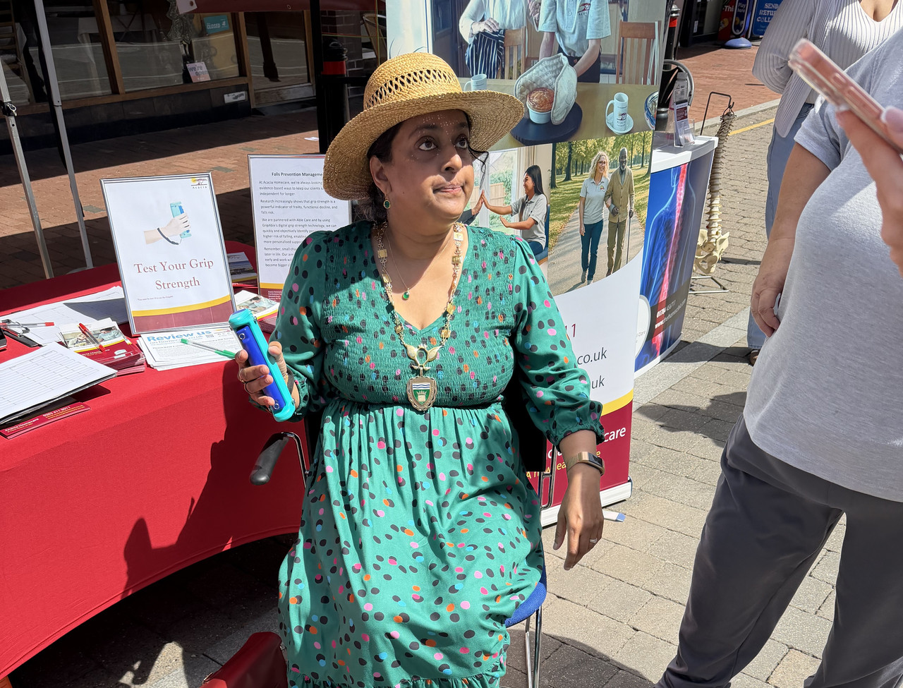 Beena Ringham at the Acacia Homecare booth for Magna Carta Day
