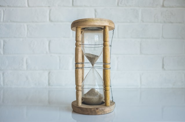 sand timer wrapped in wire