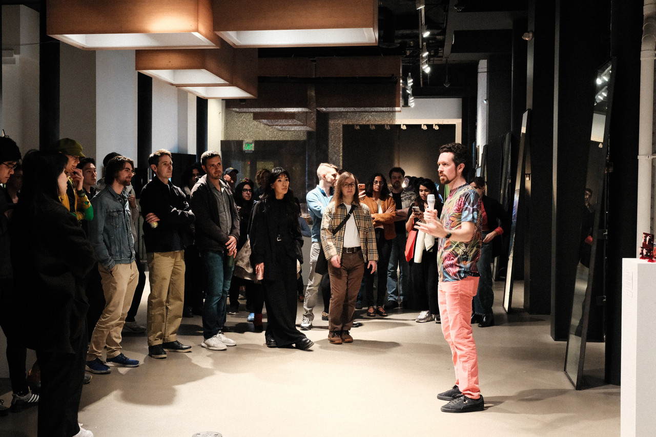 Rainbow speaking at the showcase opening