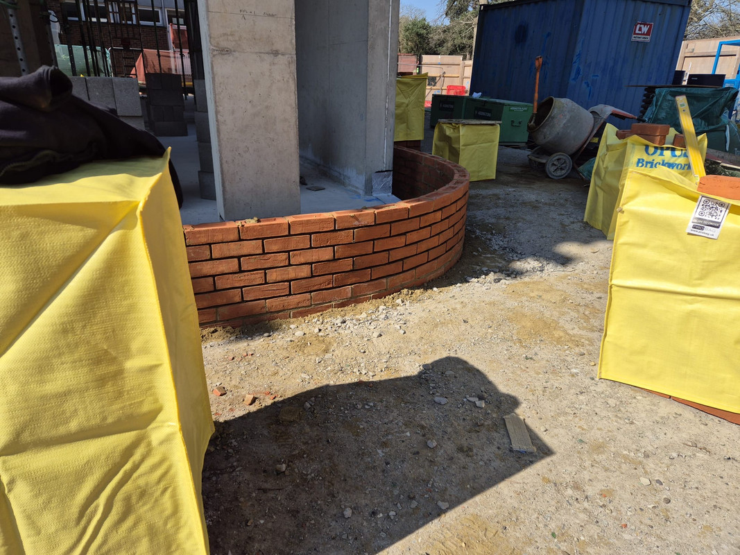Decorative brick patio with circular pattern