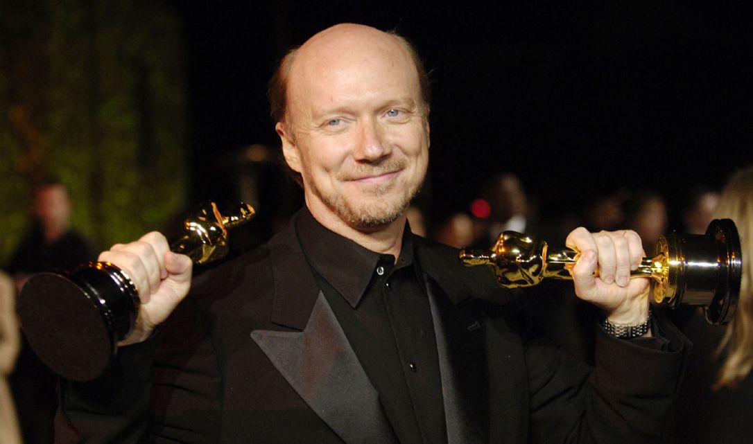 Paul Haggis holding the winning awards for Crash Oscar in 2006 at Hollywood California