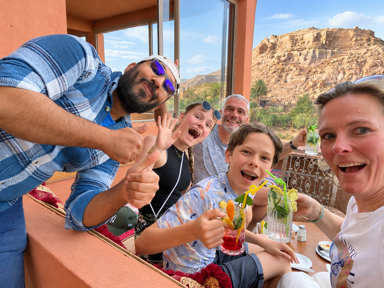Family with drinks on the terrace at Chez Moussa in Aït Benhaddou