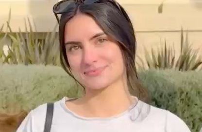 A Gorgeous Girl In A White Shirt Is Flashing Her Boobs.