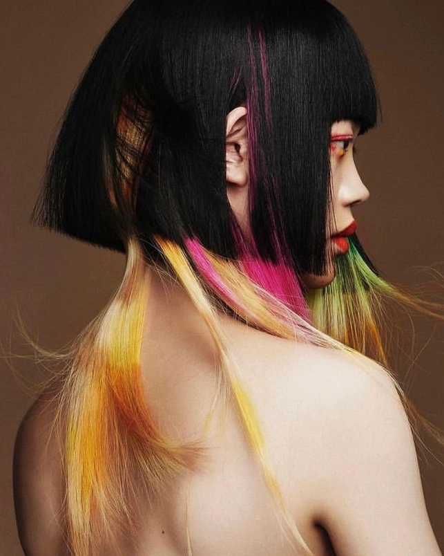 Flat iron used to create a sleek and straight look of Jellyfish haircut