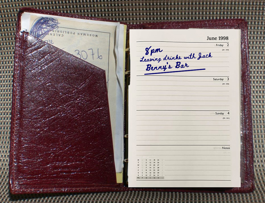 Old red leather filofax open on a diary page in 1998 with 8pm leaving drinks with Jack Benny's bar written inside