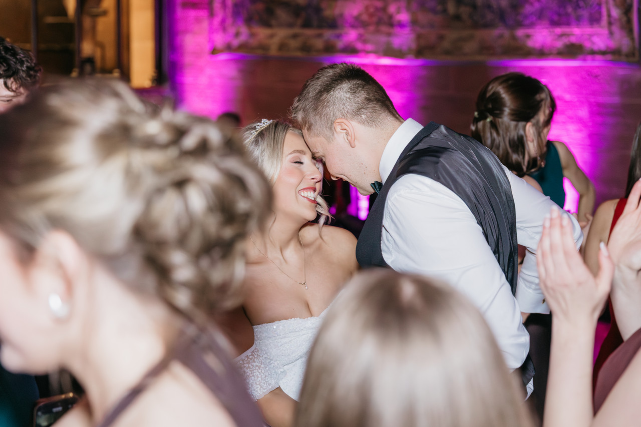 Guests celebrating at the wedding reception