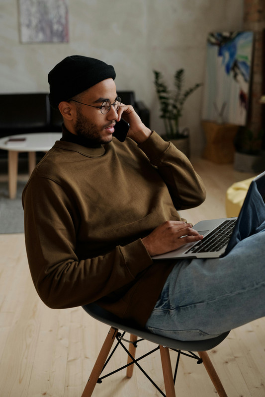 Business traveller working from serviced apartment