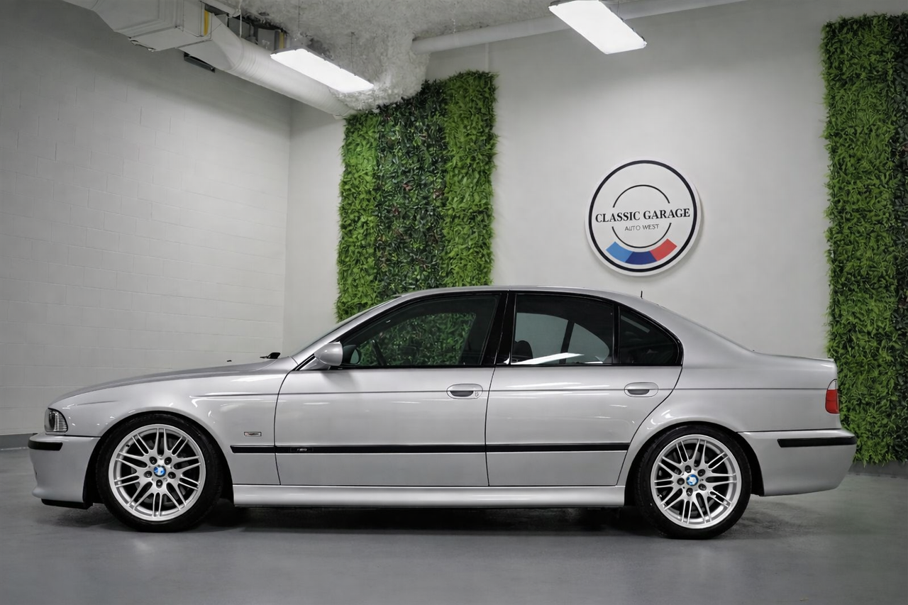 Silver BMW E39 M5 in showroom