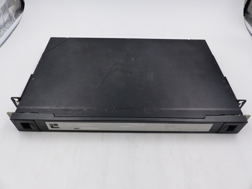 ADC 1U FMT-DST090000-S16B FIBER MANAGEMENT TERMINATION/STORAGE PANEL 16 SC/UPC