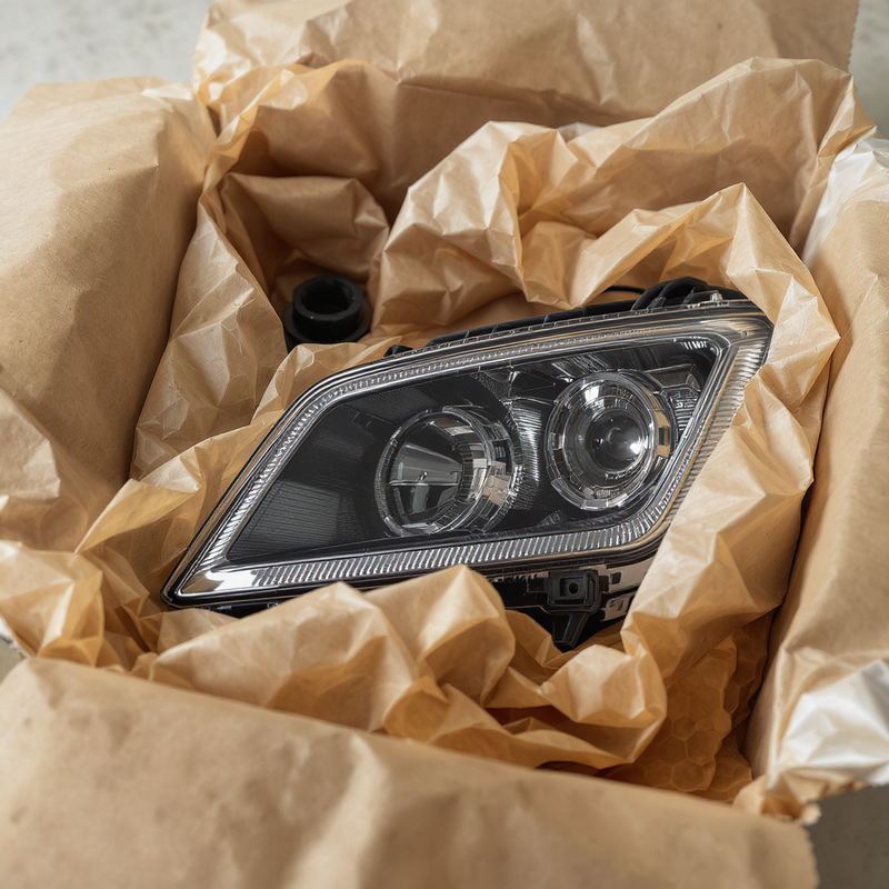 Упаковка боковых зеркал авто сетчатой бумагой для безопасной доставки