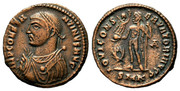 Nummus a nombre de Constantino I. IOVI CONSERVATORI AVGG. Júpiter a izq. Cycico Smg-1315