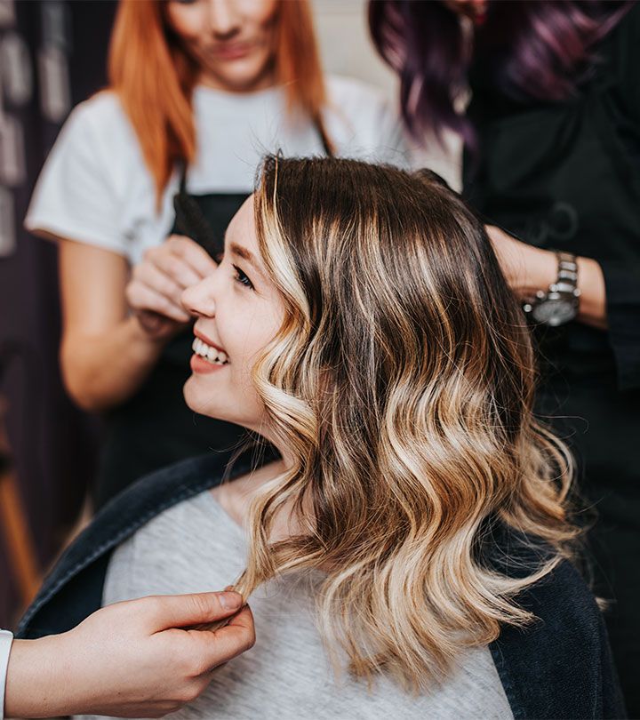 Smiling brown blonde girl in hair salon