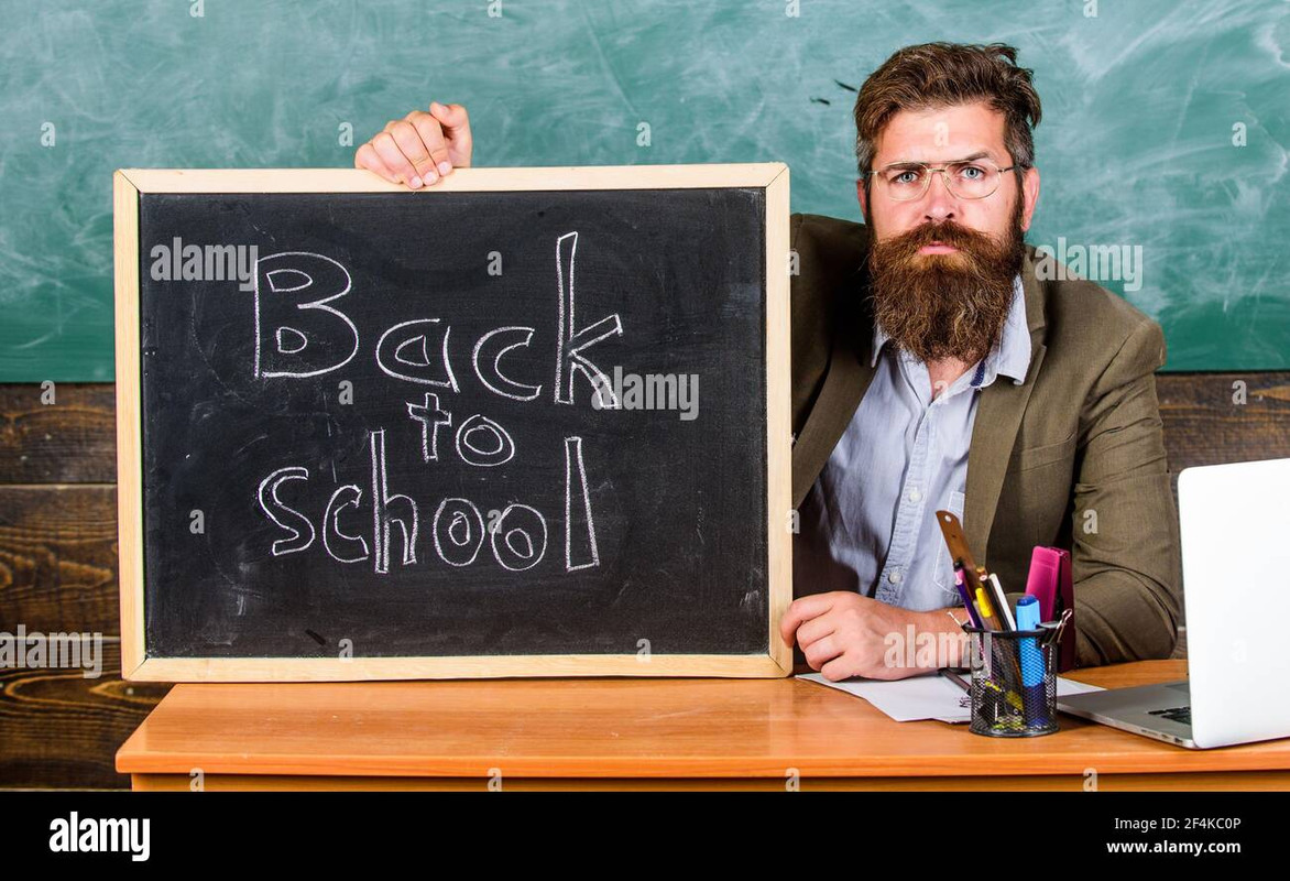 welcome-back-teacher-or-school-principal-welcomes-with-blackboard-inscription-back-to-school-teacher.jpg