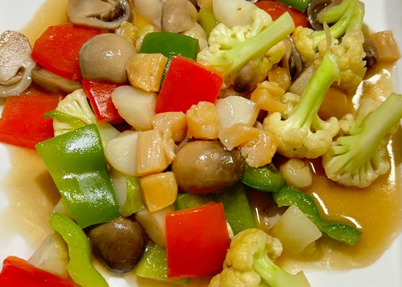 12. Capesante saltate con funghi