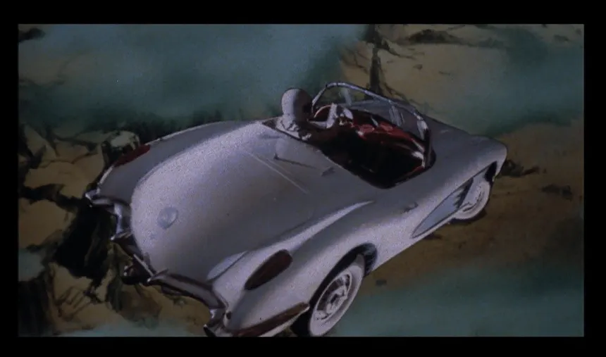 A convertible hurdling towards Earth after being Jettisoned from a NASA style spacecraft.