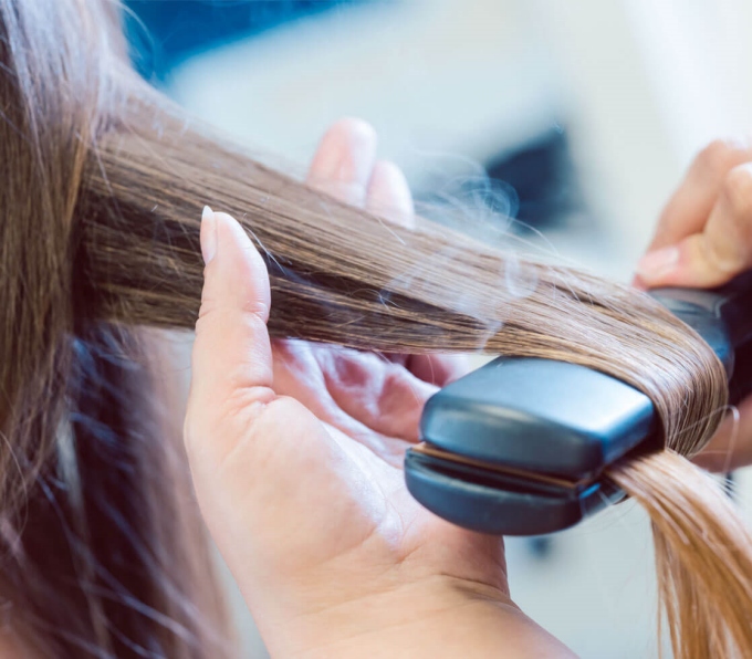Burned damaged hair by flat iron
