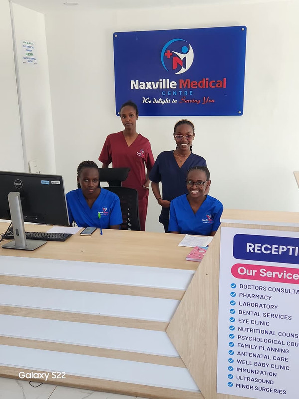 A friendly hospital reception team.