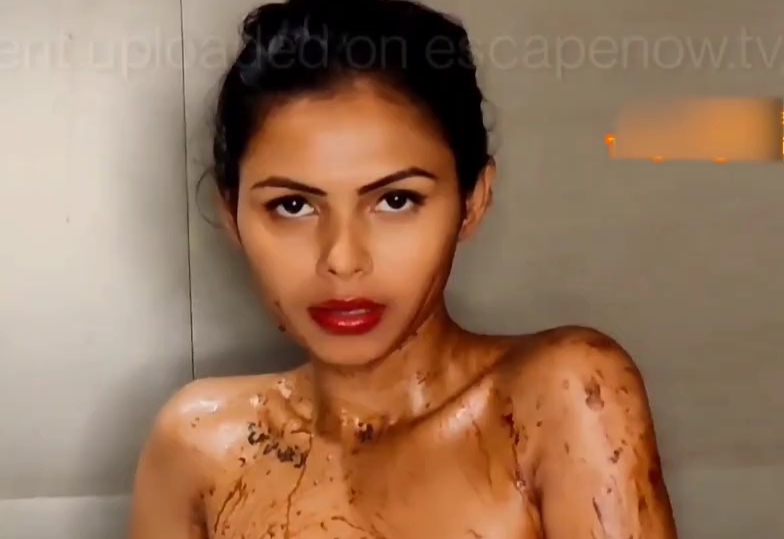 Beautiful Model Full Nude with Full Face Covered in Chocolate