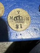 Moneda o ficha de finca para identificar MVH