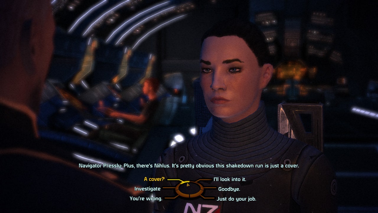 A screenshot of of Mass Effect 1, showing player character Commander Shepard discussing her mission with Navigator Pressly.