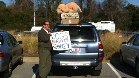 ht-dogs-against-romney-sign-thg-120105-wblog
