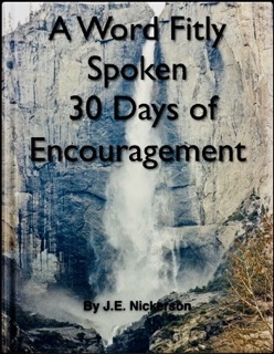 Vibrant abstract painting with dynamic brushstrokes in red, orange, and yellow tones.