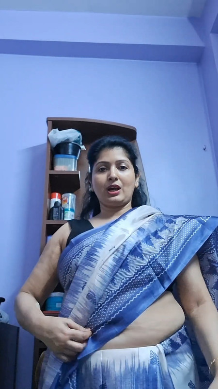 Bengali Fleshy aunty sexy armpits wide belly and deep navel show in blue saree.mp4_snapshot_00.58.06
