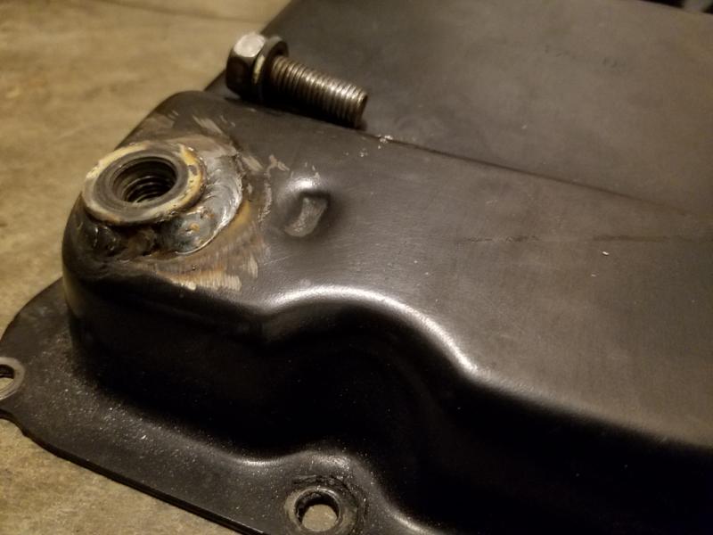 Welding ATF drain plug bung onto pan Bob Is The Oil Guy