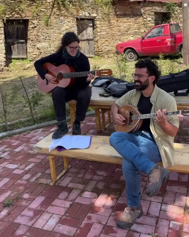 Apostolis and Efthimia playing music