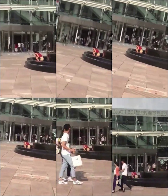 Chinese-lady-pops-squat-in-water-fountain-in-public-2.jpg