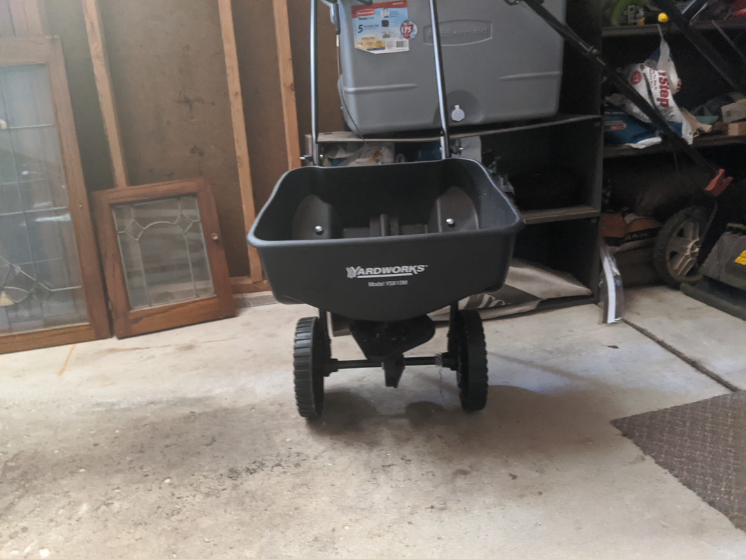 What is the importance of choosing a spreader for smaller yards? Lawn