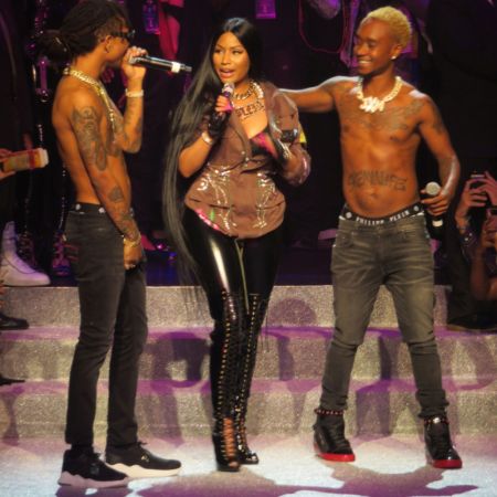 Slim and his brother with Nicki Minaj