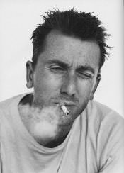 Tim Roth smoking a cigarette (or weed)
