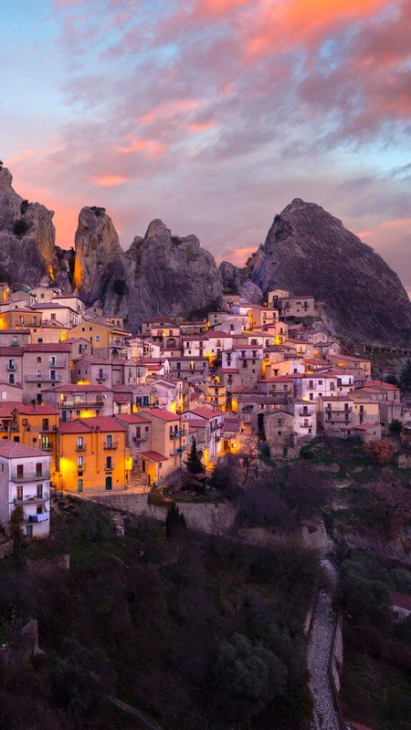 Sunset in Lucan Dolomites over Castelmezzano village, Potenza, B