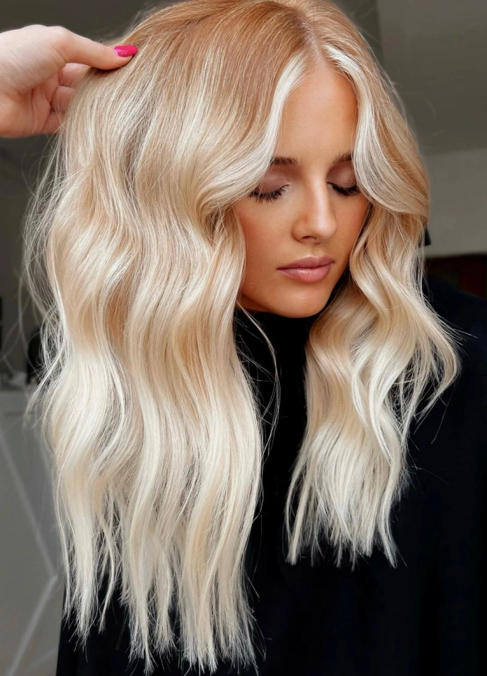 Platinum blonde hair with a red base
